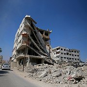  En förstörd byggnad i Zamalka i östra Ghouta efter bombardemang av regeringsstyrkor (april 2013).