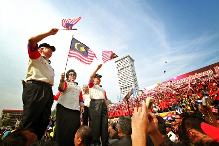 Najib Razak och frun Rosmah Razak deltar i Malaysia-dagen den 16 september 2011.