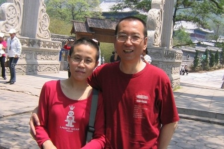 Paret Liu Xia och Liu Xiaobo. Liu Xiaobo avled 13 juli efter att ha suttit fängslad sedan 2008. Liu Xia har hållits i husarrest utan domstolsbeslut.